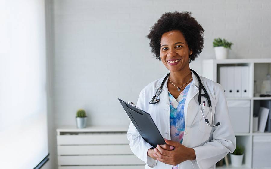 Primary care provider with a male patient at a men's health visit in Henderson NV