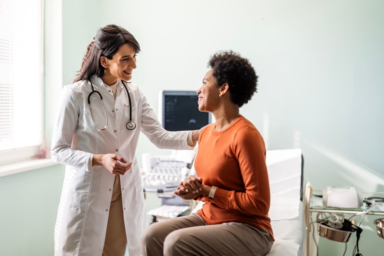Primary care provider warmly welcoming a patient at a Henderson NV family medicine visit