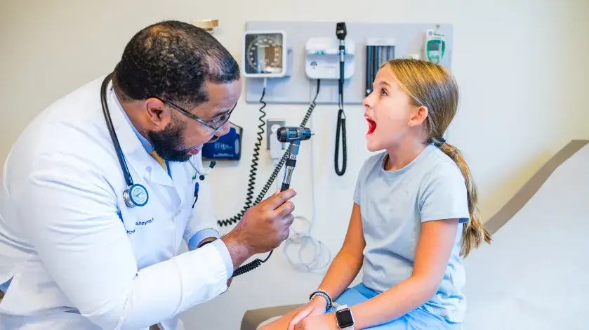 Pediatric ear exam during a family preventive care visit in Henderson NV