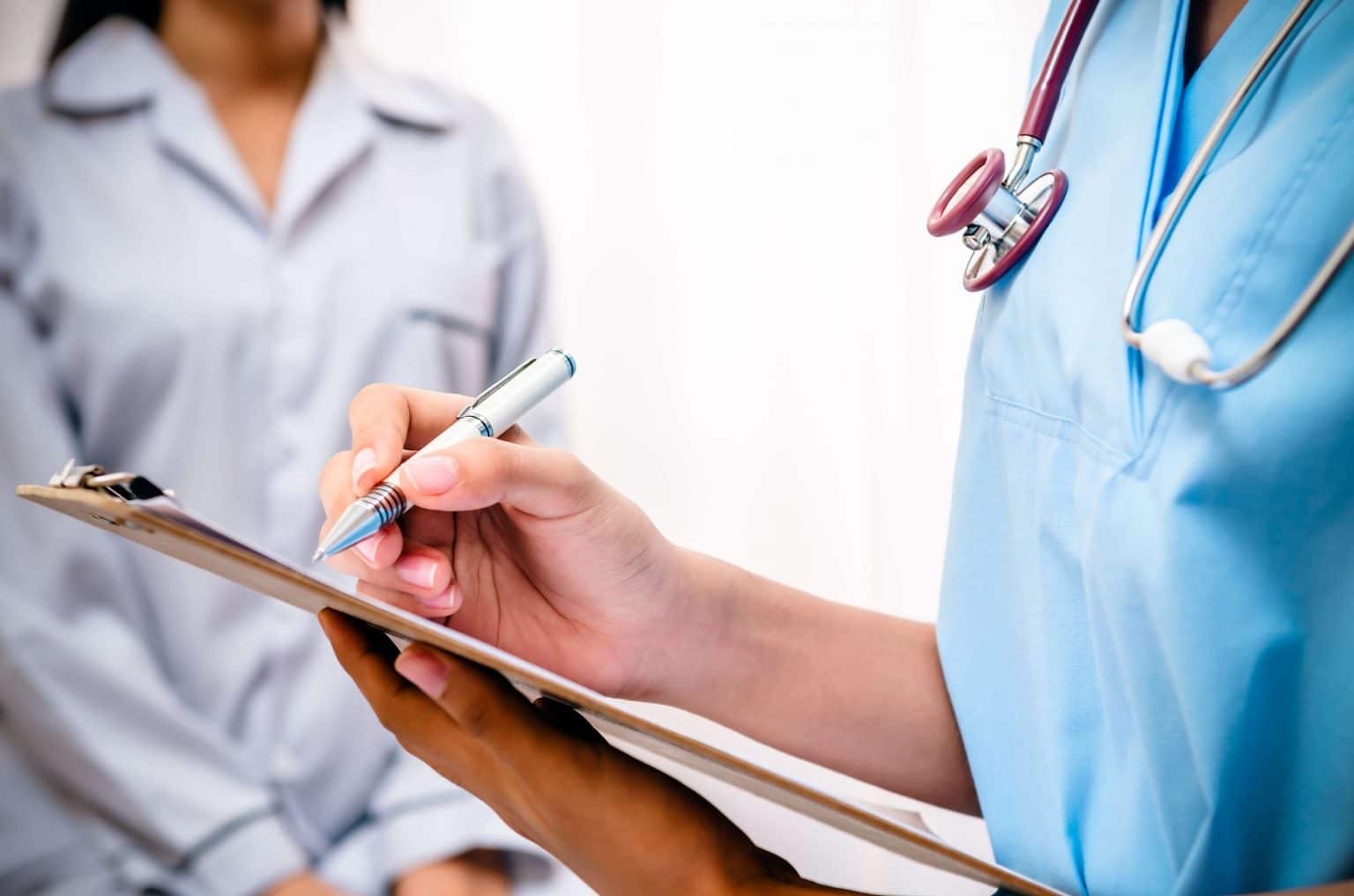 Primary care provider in an unhurried, compassionate consultation with a patient at a Henderson NV practice