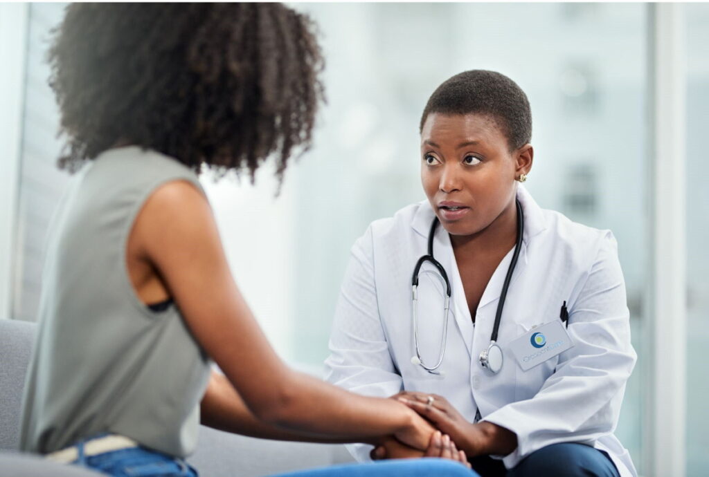 Henderson NV primary care provider compassionately listening to a patient during a visit