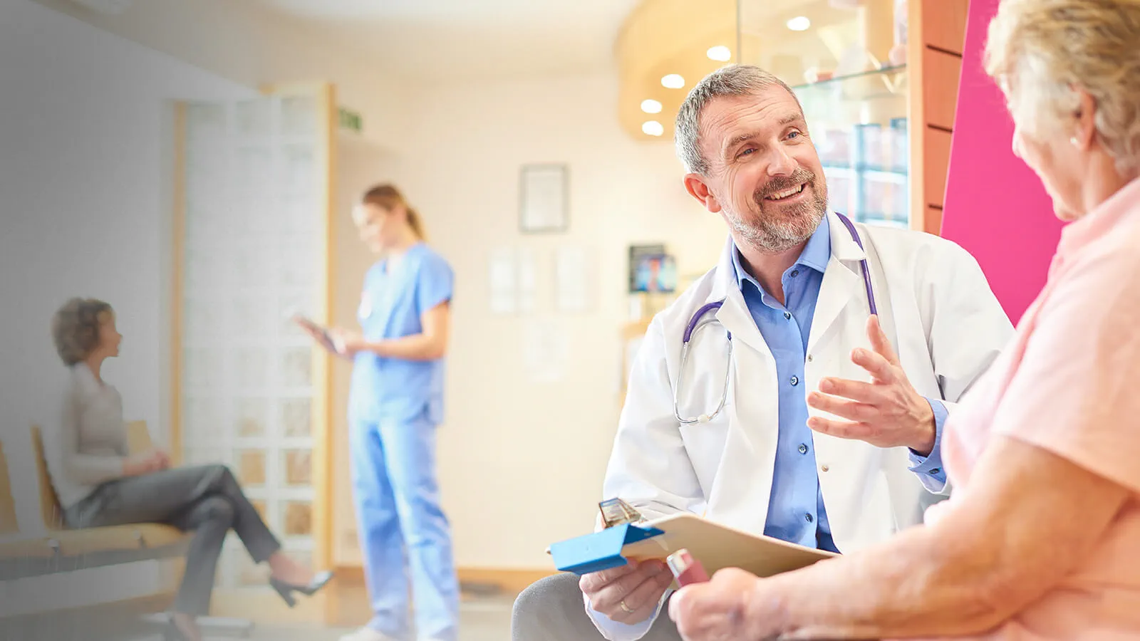 Medicare patient reviewing wellness visit results with a provider in Henderson NV