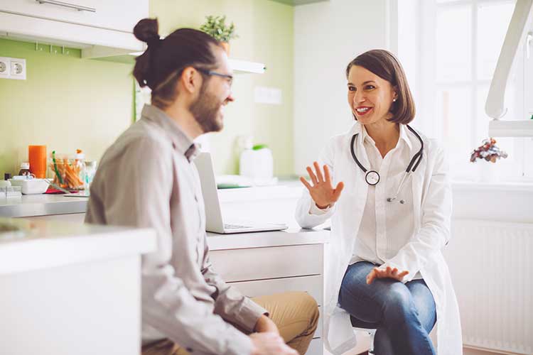 Primary care provider talking through nutrition and lifestyle counseling with a patient in Henderson NV