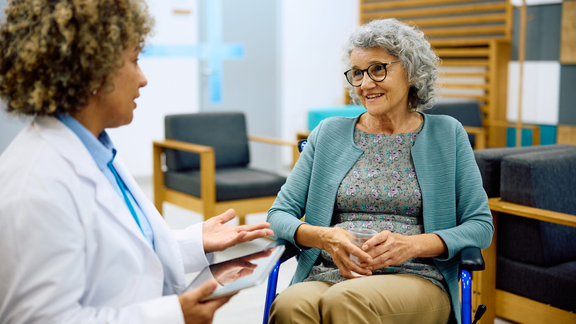 Senior Medicare patient discussing her Annual Wellness Visit plan with her primary care provider in Henderson NV